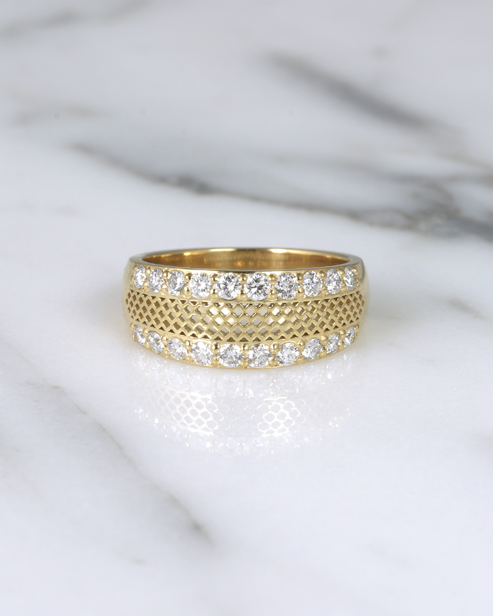 14k Gold Ring with natural diamonds and negative space pattern. Designed and made in Montreal by Entyche