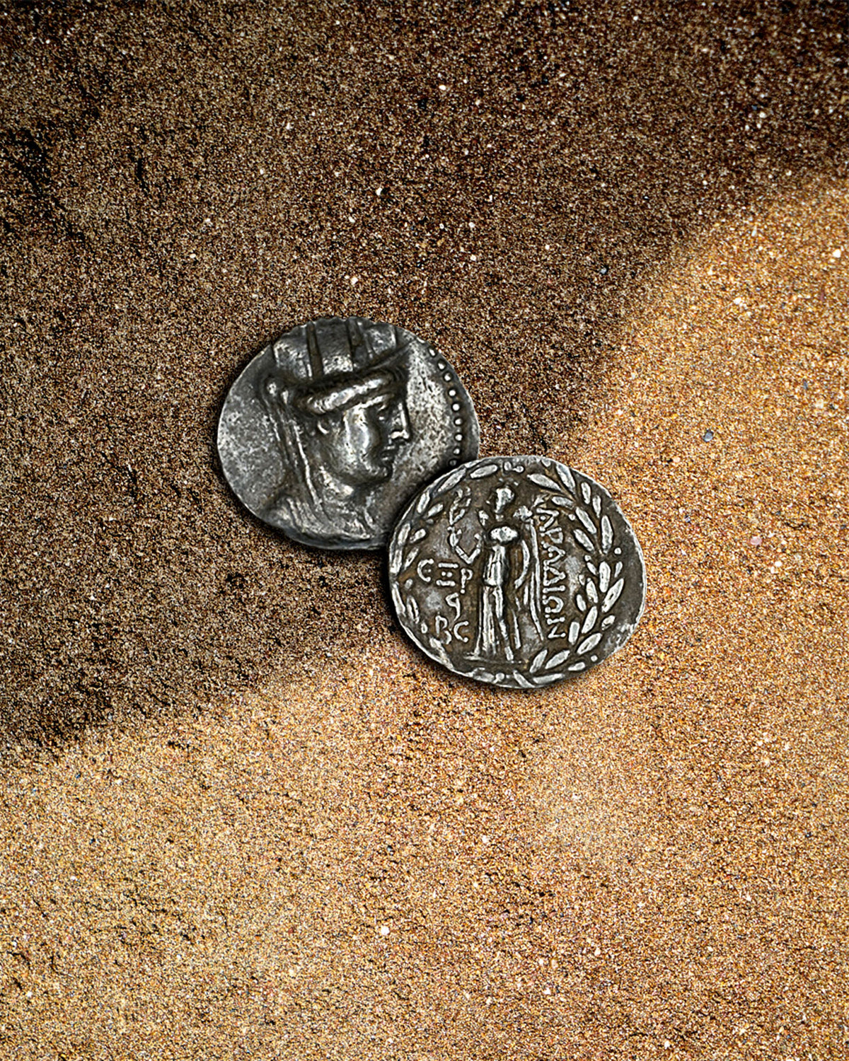 hellenistic tetradrachm, tyche, on sand