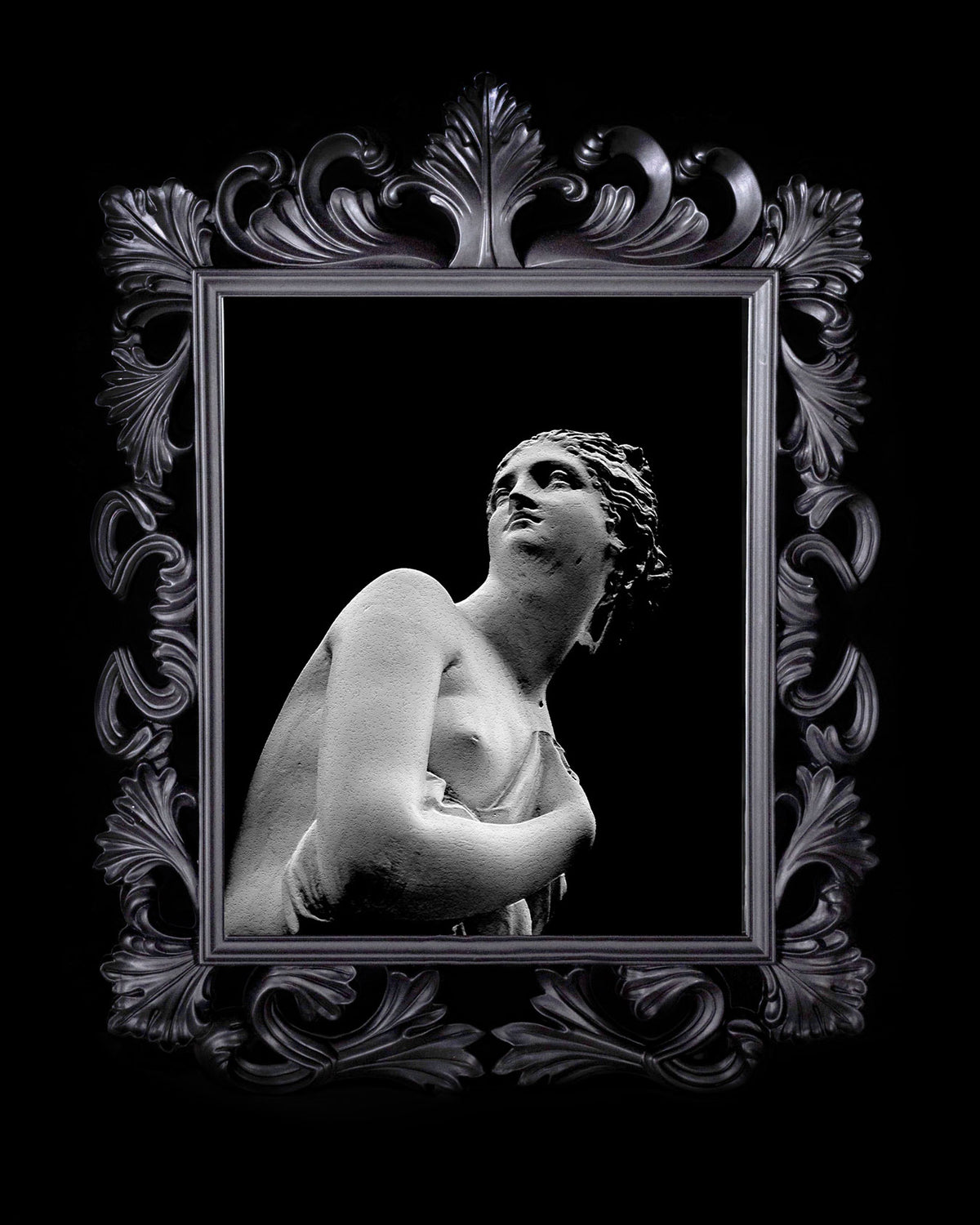 framed photograph of statue, black frame, chiaroscuro